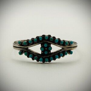 Vintage Zuni Sterling Snake-Eye Turquoise Cuff — artist-stamped HRG